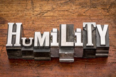 humility word in mixed vintage metal type printing blocks over grunge wood