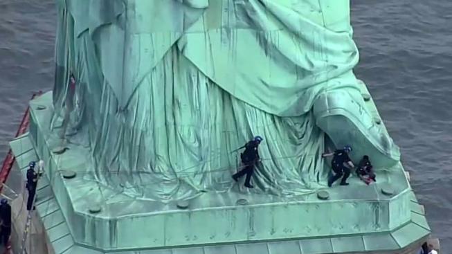 ICE_Protestor_Caught_After_Scaling_Statue_of_Liberty