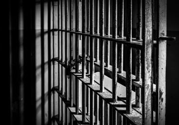 prison-jail-cell-bars-inmate-corrections-stock-generic-1536208655